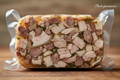 Tranche de fromage de tête sous vide avec "Photo provisoire"